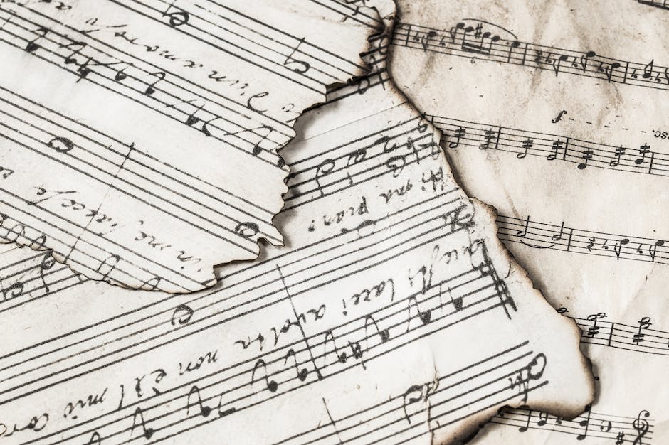 Illustration of musical notes and a scale to represent understanding scales in music composition